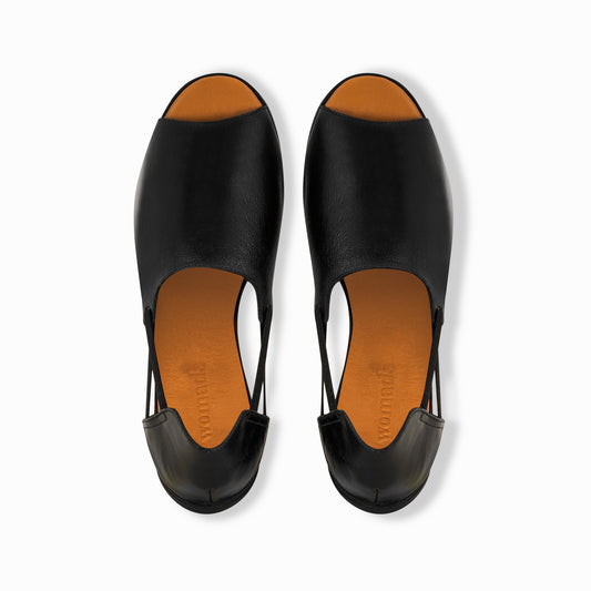 Womads black flat sandals top view