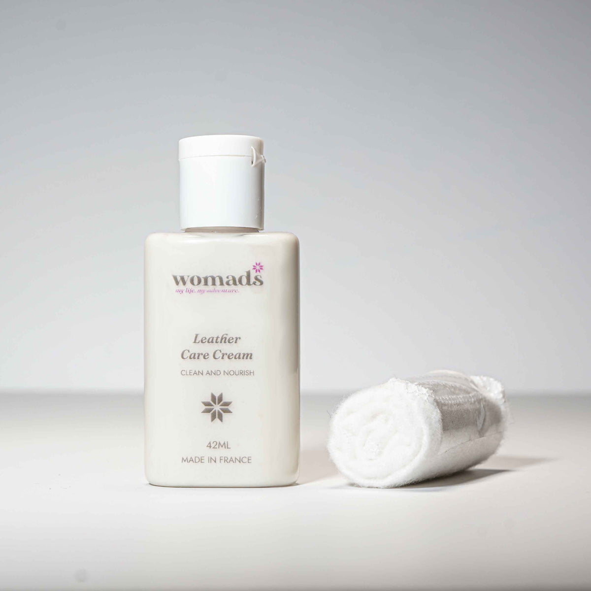leather care cream with rolled up cloth