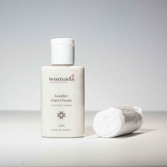 leather care cream with rolled up cloth