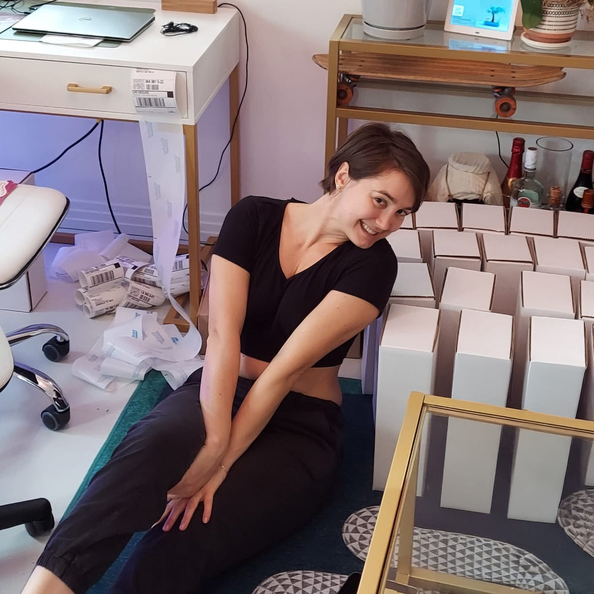 Lisa packing the first Womads orders from her living room