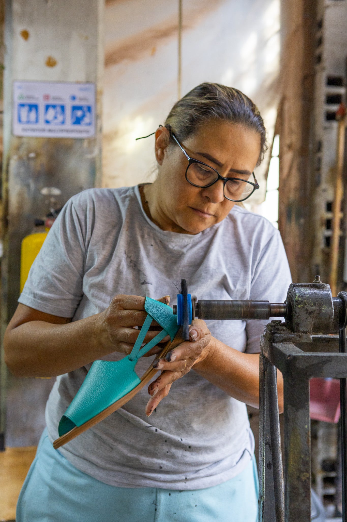 Woman making shoes