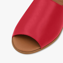 Red sandal with open toe on a white background