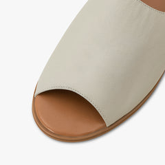 black and white sandals peep toe leather close up