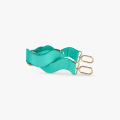 Teal strap with gold hardware on a white background