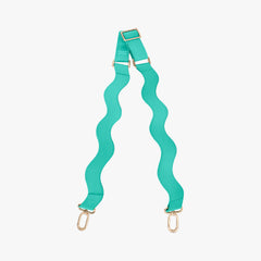Teal strap with gold hardware on a white background