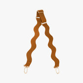 Brown wavy strap with gold hardware on a white background