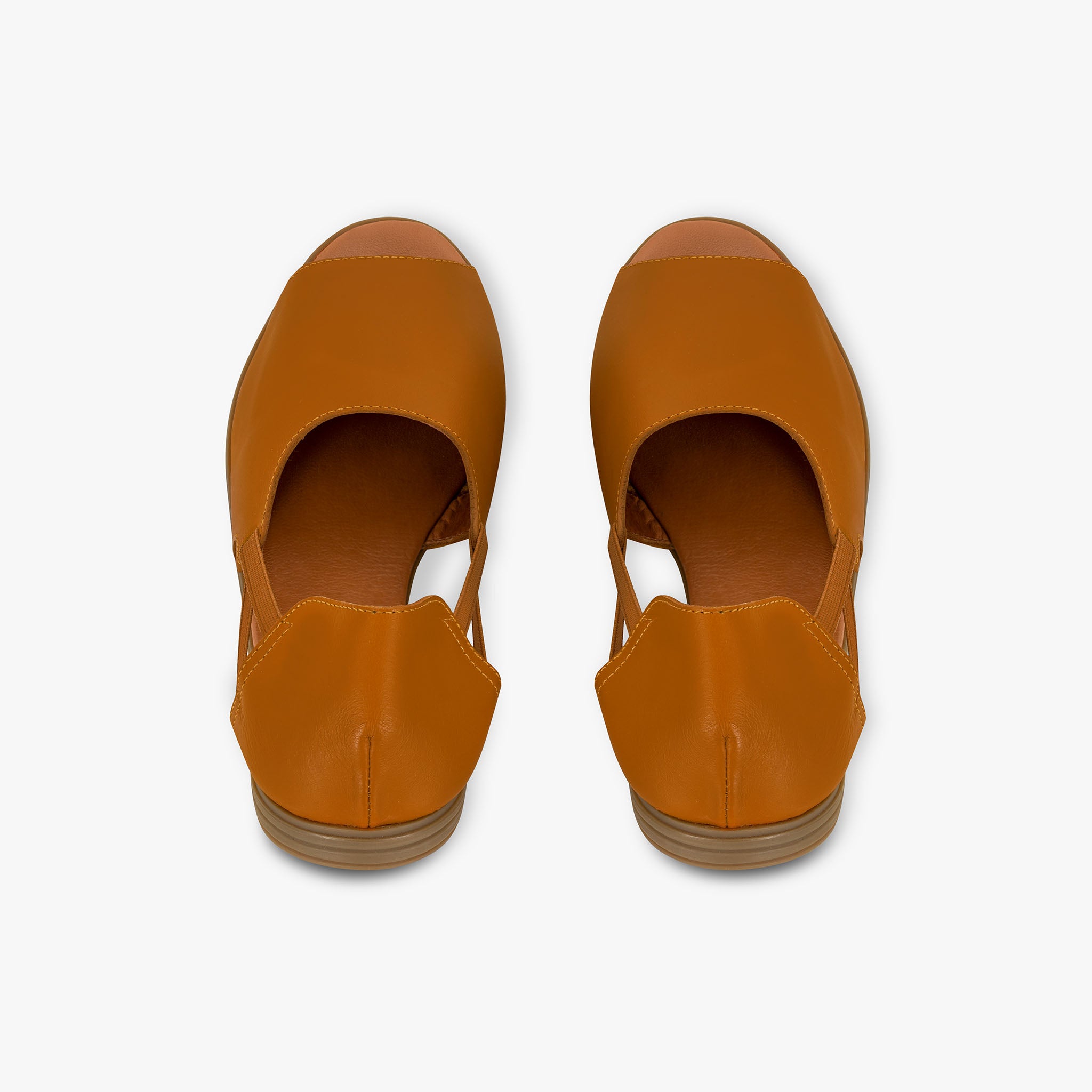 Pair of brown open-toe shoes on a white background