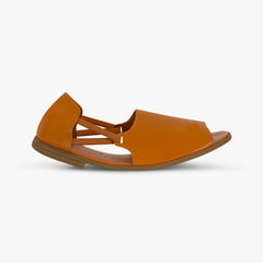Brown sandal with cut-out design on a white background