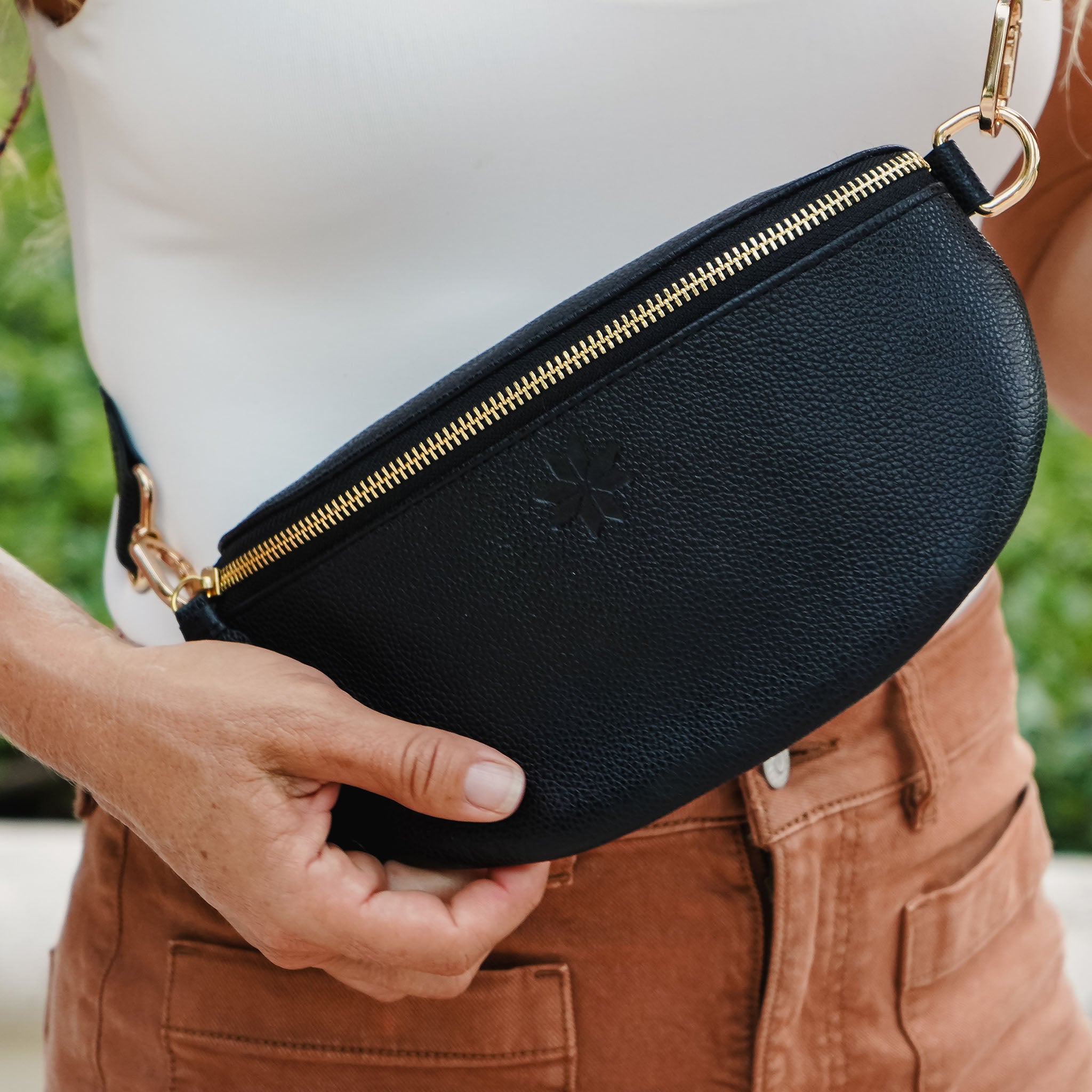 close up of black leather crossbody bag