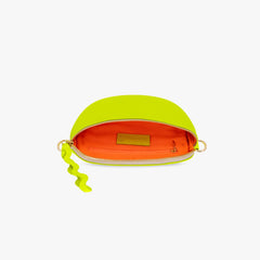 Neon green crossbody with orange interior on a white background