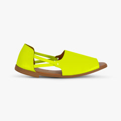 Neon yellow sandal with brown sole on a white background