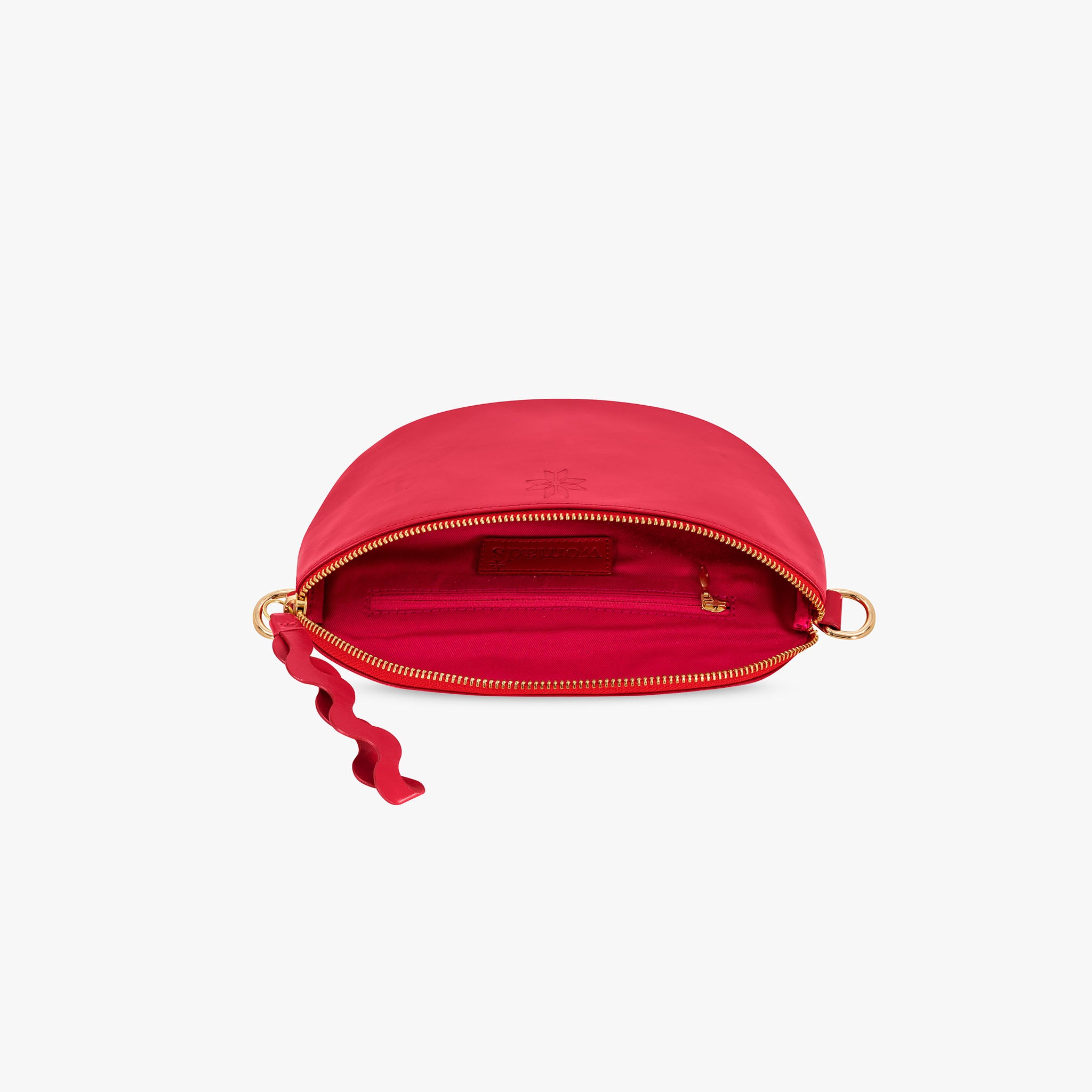 Red leather crossbody bag open to pink lining

