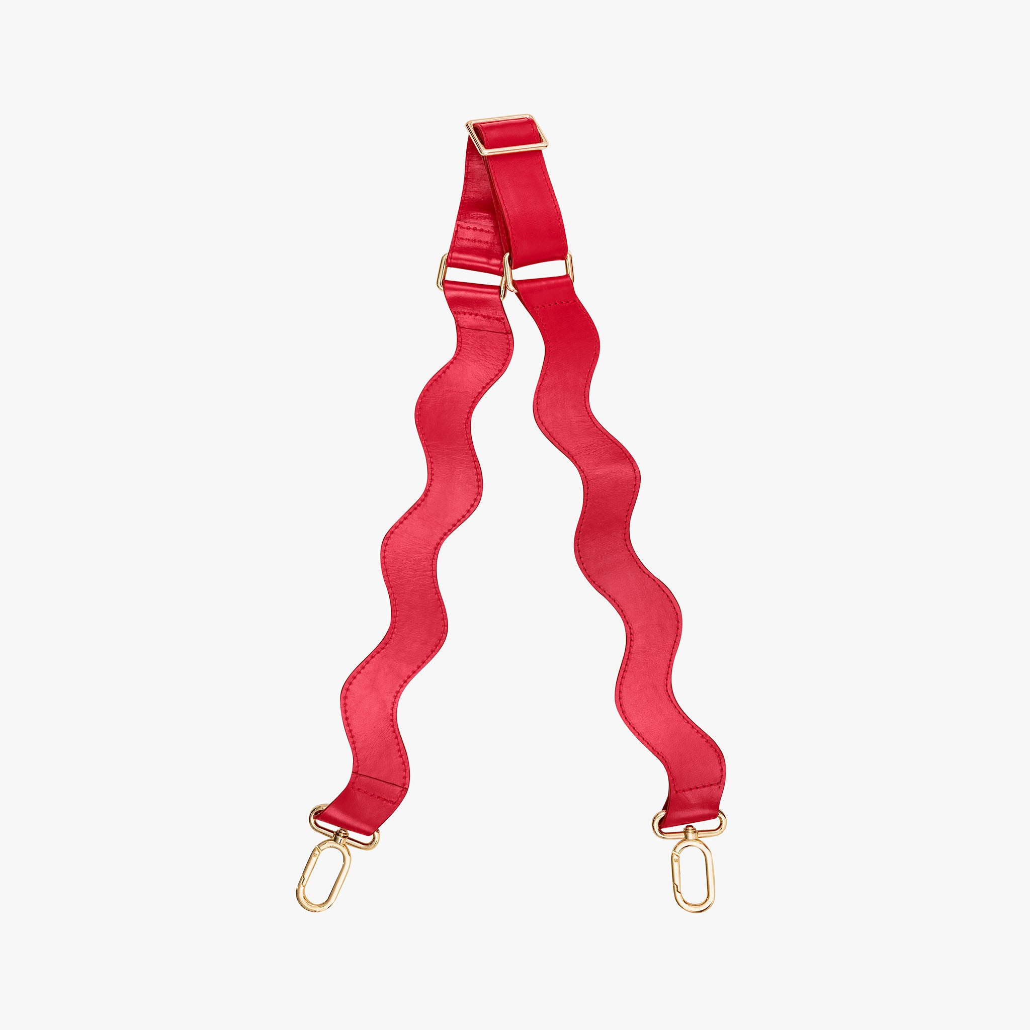 Red strap with gold hardware on a white background