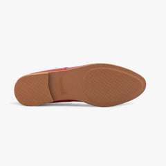 Brown sole of a shoe on a white background
