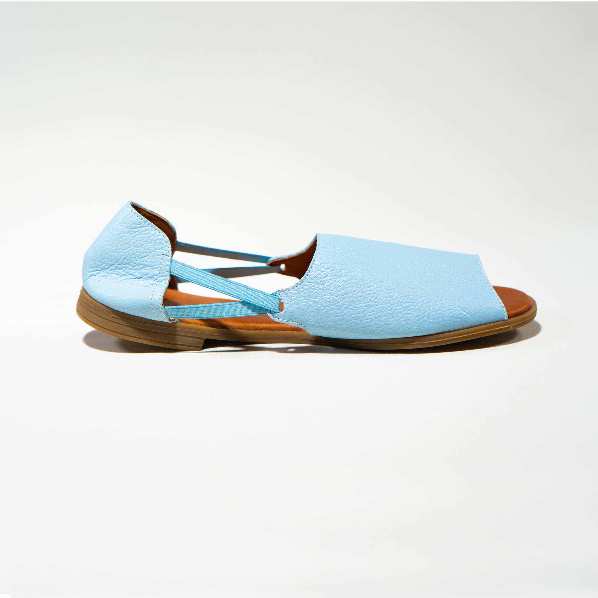 Womads blue sandals side view