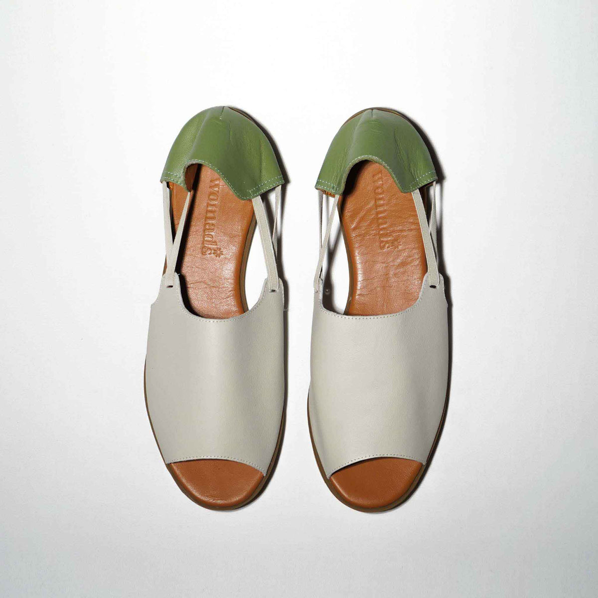 Womads green and cream sandals top view