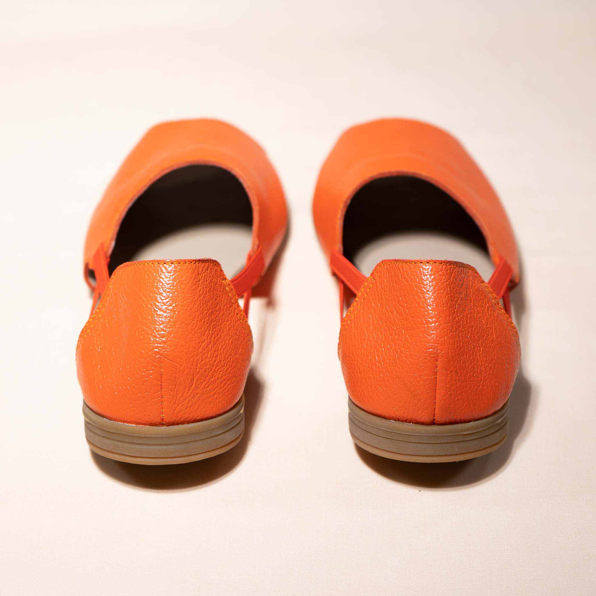 Womads orange sandals back view