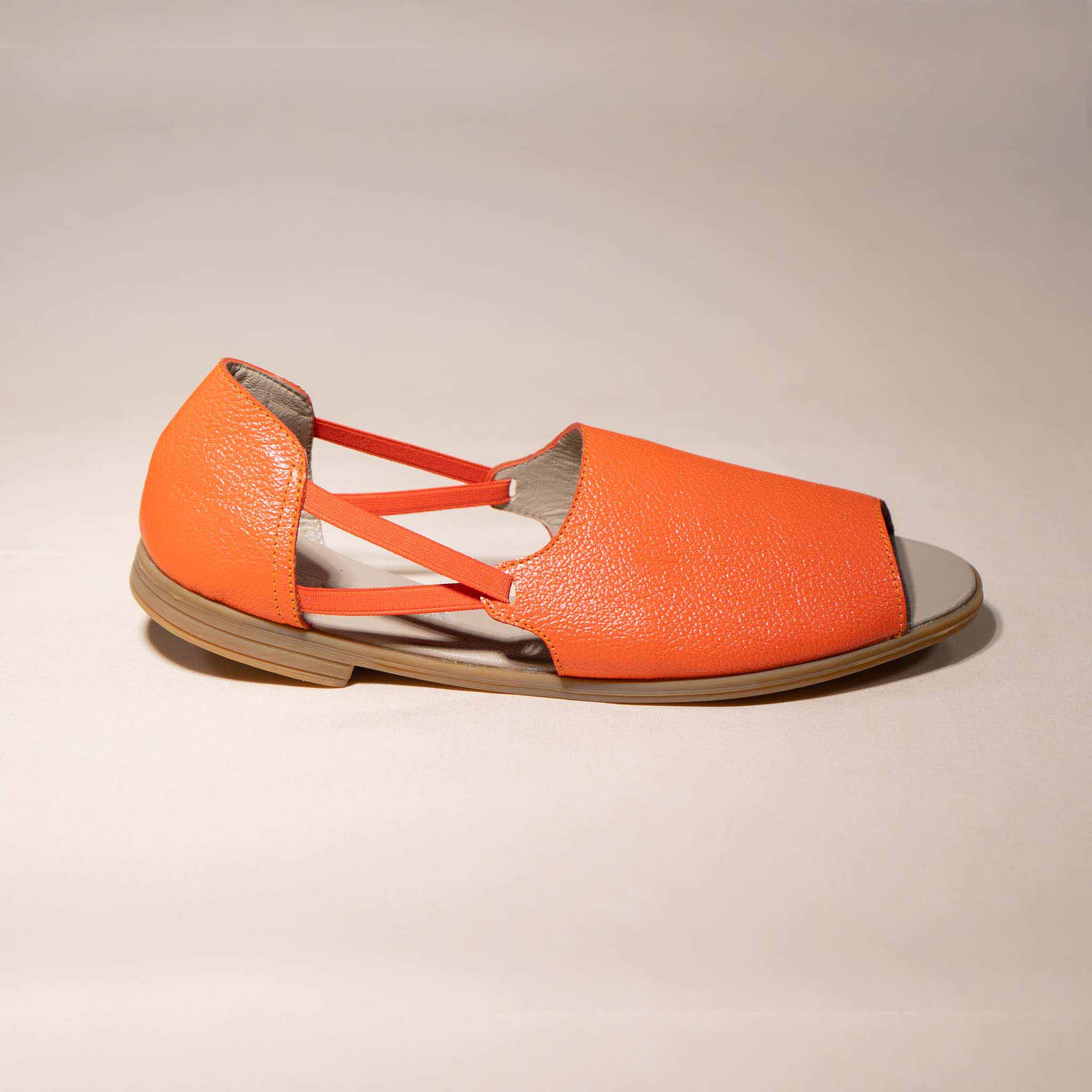 Womads orange sandals side view