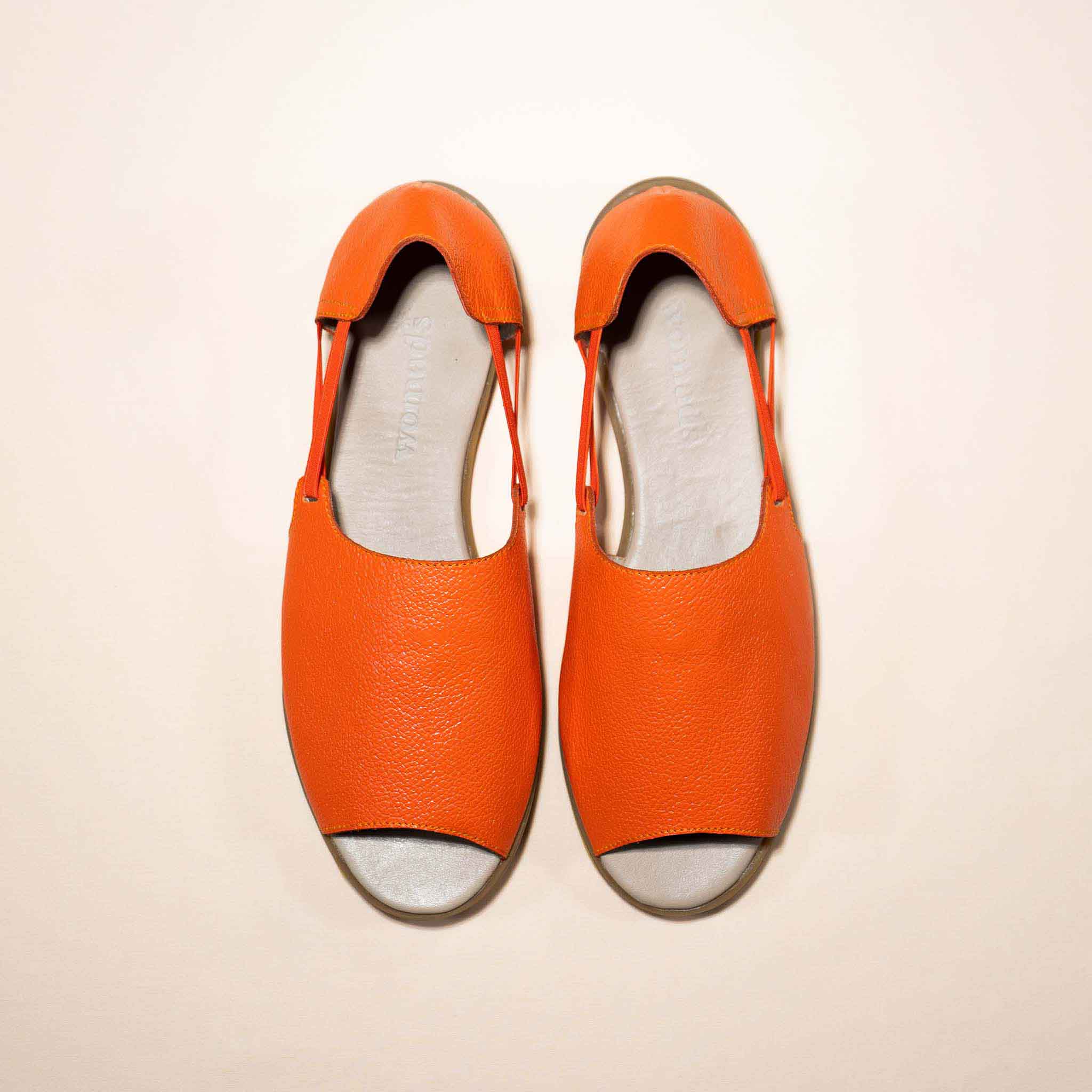 Womads orange sandals top view