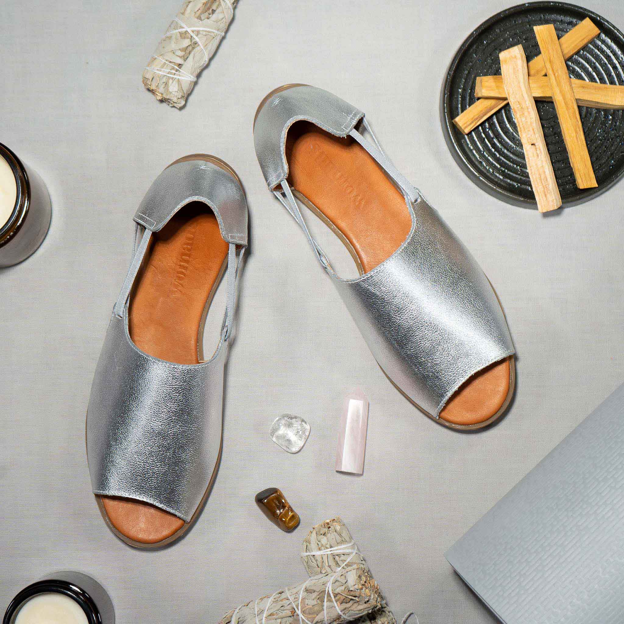 Womads silver sandals with yoga accessories