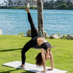 Yoga woman wearing Womads silver sandals